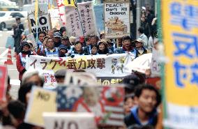 Antiwar protests continue as Japan throws support behind U.S.